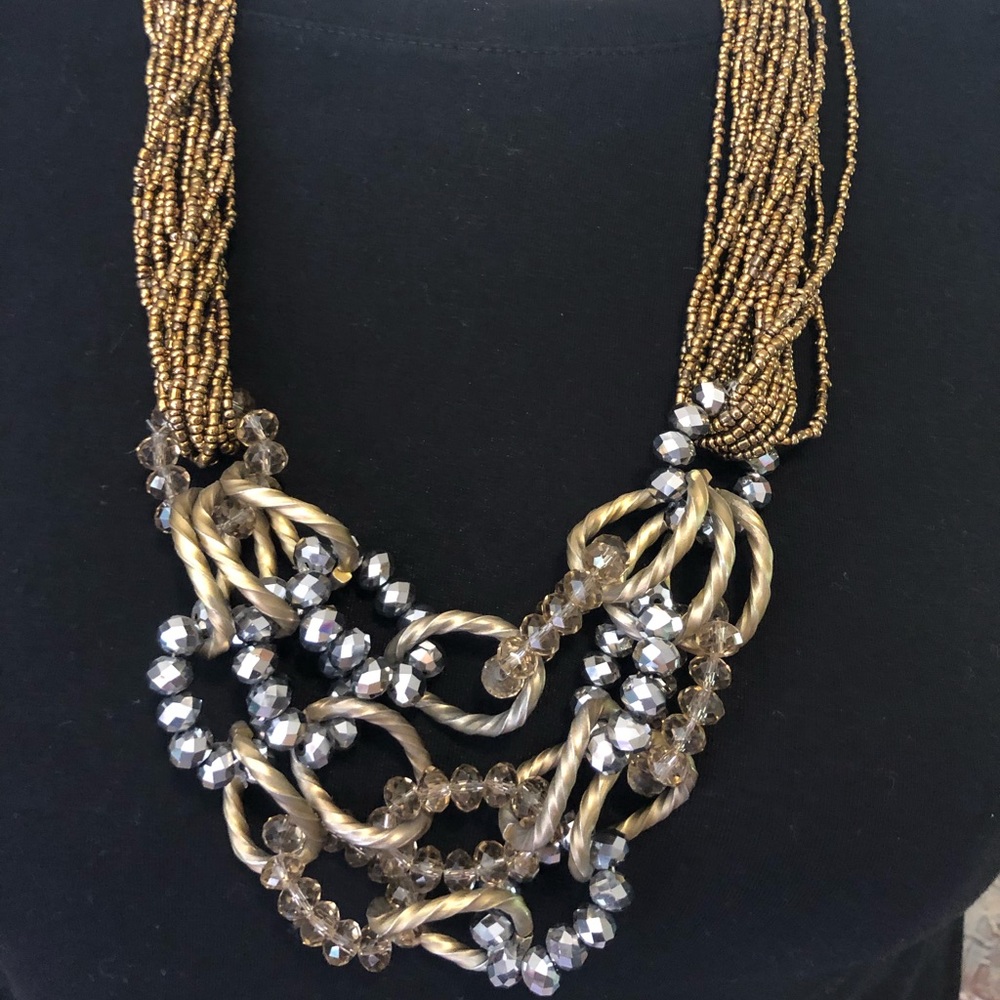 Gold beaded necklace with silver bling beads